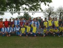 This is a picture of two clubs, Costessey Crown and Mousehold AFC, with referee Ian Banham, at the first Tim Moore memorial game on 2 May 2009. This was held immediately after the Wilch Cup semi-final game, and Ian refereed both games. Tim Moore played for both teams and was tragically killed on 2 April this year.
