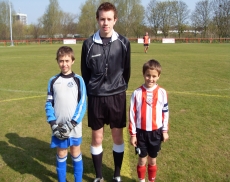 Referee James Cameron with Captains from under 9s final