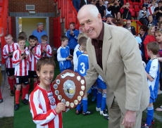PSV Stone captain winners under 9s Shield with Gordon Evans